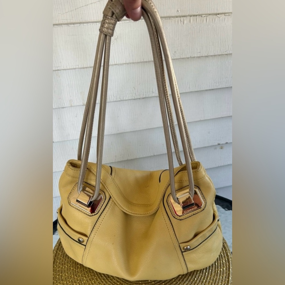 B. Makowsky Yellow Hobo Bag